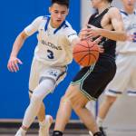 Thunder Mountains Bryson Echiverri, left, steals the ball from Colonys Max Escobedo at TMHS on Friday, Jan. 11, 2019. Colony won 46-27. (Michael Penn | Juneau Empire)