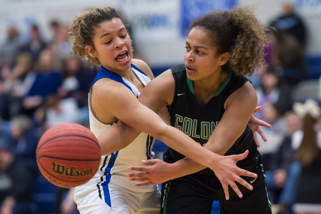 Thunder Mountains Tzadi Hauck, left, pressures Colonys Kali Bull at TMHS on Friday, Jan. 11, 2019. Colony won 58-28. (Michael Penn | Juneau Empire)