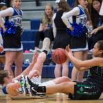 Thunder Mountains Samantha Dilley, left, and Colonys Kali Bull go to the floor after a loose ball at TMHS on Friday, Jan. 11, 2019. Colony won 58-28. (Michael Penn | Juneau Empire)