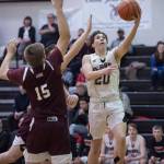 Juneau-Douglas Cooper Kriegmont lays the ball up against Ketchikan at JDHS on Friday, Jan. 11, 2019. JDHS won 75-67. (Michael Penn | Juneau Empire)