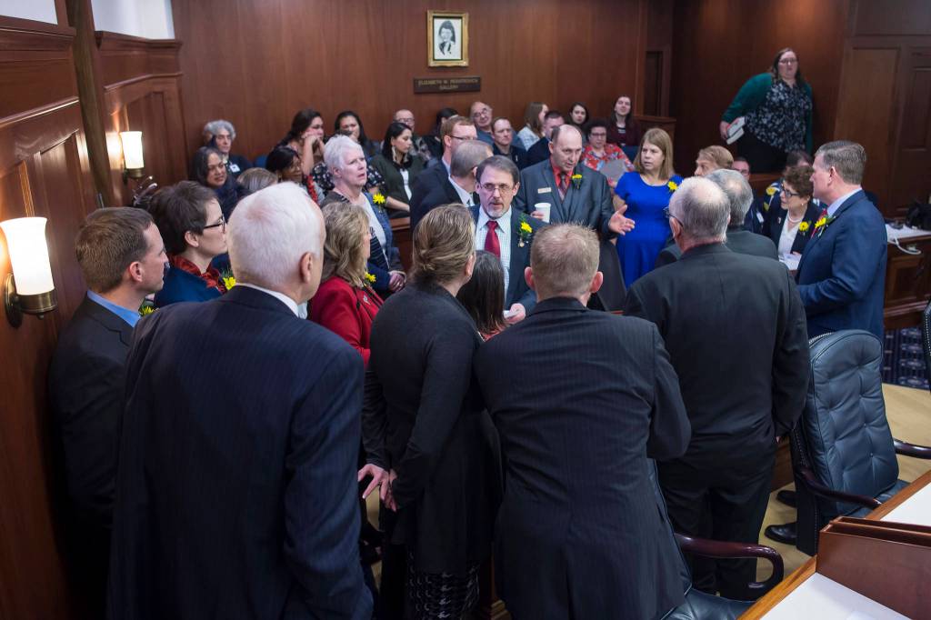 House Republicians huddle for a decision on the opening day of the 31st Session of the Alaska Legislature on Tuesday, Jan. 15, 2019. (Michael Penn | Juneau Empire)
