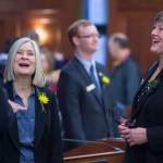 Rep. Andi Story, D-Juneau, center, and Rep. Sara Hannan, D-Juneau, share a laugh with Rep. Bart LeBon, R-Fairbanks, on the opening day of the 31st Session of the Alaska Legislature on Tuesday, Jan. 15, 2019. (Michael Penn | Juneau Empire)