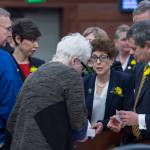 Democratic legislators huddle on the opening day of the 31st Session of the Alaska Legislature on Tuesday, Jan. 15, 2019. (Michael Penn | Juneau Empire)