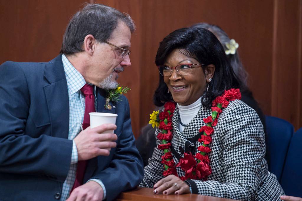 Rep. George Rauscher, R-Sutton, left, speaks with Sharon Jackson on the opening day of the 31st Session of the Alaska Legislature on Tuesday, Jan. 15, 2019. Jackson is Gov. Michael J. Dunleavys pick to replace Nancy Dahlstroms House District 13 seat for Chugiak. That position was left vacant in December after Dunleavy appointed Dahlstrom to be Department of Corrections commissioner. (Michael Penn | Juneau Empire)