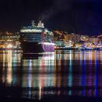 The Holland America Line cruise ship Westerdam slips out of Juneaus downtown harbor just before 11 p.m. on Tuesday, Oct. 2, 2018. The Norwegian Pearl also visited Tuesday, the last day of the season. (Michael Penn | Juneau Empire)