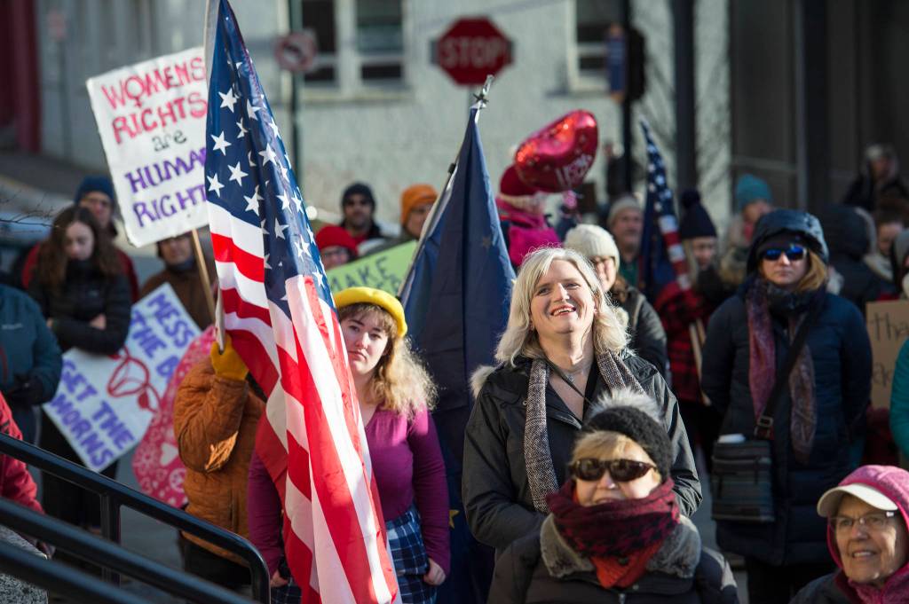 Allison Caputo is introduced at the Womens March on Juneau in front of the Alaska State Capitol on Saturday, Jan. 19, 2019. (Michael Penn | Juneau Empire)