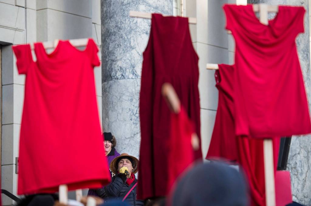 Lyle James sings at the Womens March on Juneau in front of the Alaska State Capitol on Saturday, Jan. 19, 2019. (Michael Penn | Juneau Empire)