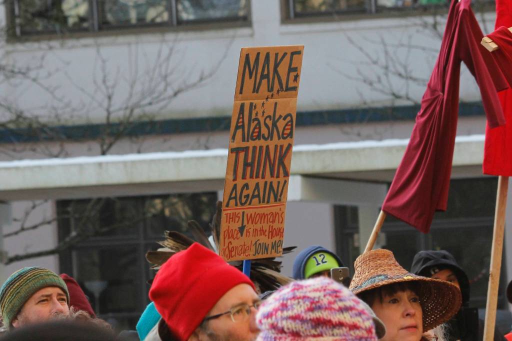 Attendees hold up signs at Juneaus Womens March on Saturday, Jan. 19, 2019. (Alex McCarthy | Juneau Empire)
