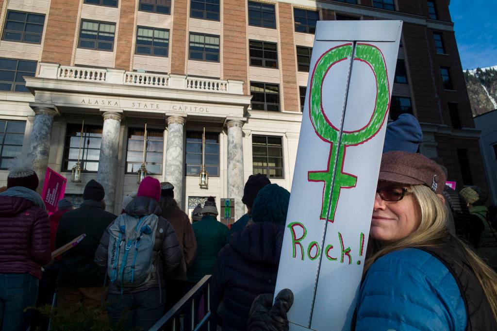 Tania Lewis attends the Womens March on Juneau in front of the Alaska State Capitol on Saturday, Jan. 19, 2019. (Michael Penn | Juneau Empire)