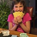 Rhiannon Wenzel plays Monopoly. (Vivian Faith Prescott | For the Capital City Weekly)