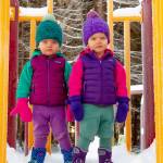 Feb. 24, 2019: Remember the old slogan, Double your pleasure, double your fun? Well it doesnt get much cuter or more fun than identical twins Elise and Claire Beason, spotted at Rotary Park in their coordinated and oh so hip outfits! For this outing, the girls sported matching colors in their wool pants from Wild Coconut, fleece jackets and vests from Patagonia, boots from Bogs, and locally knit hats from WWKnits. Warm, wide-eyed and adorable!