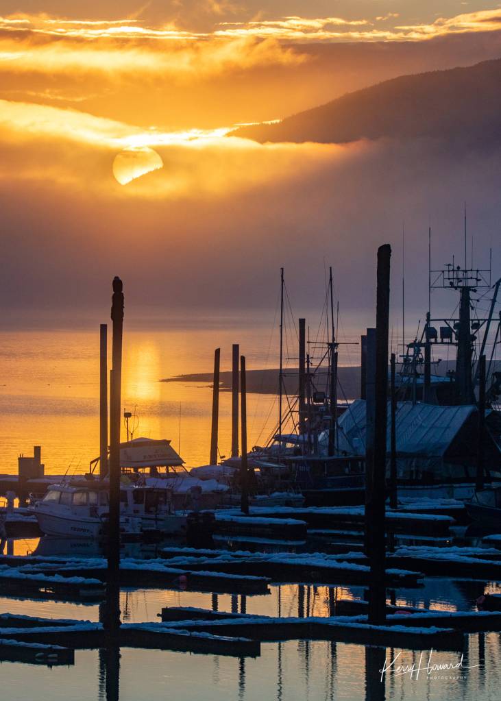 The sun sets into a fog bank in Auke Bay on Jan. 15, 2019. (Courtesy Photo | Kerry Howard)
