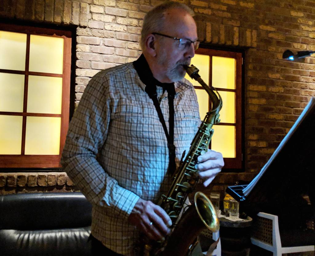 John Haywood plays saxophone during the Juneau Fives regular Thursday Night Jazz show at the Narrows Bar, Jan. 31, 2019. (Ben Hohenstatt | Juneau Empire)