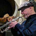Greg Kalbaugh plays trumpet during the Juneau Fives regular Thursday Night Jazz show at the Narrows Bar, Jan. 31, 2019. (Ben Hohenstatt | Juneau Empire)