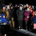 Hundreds of Juneau residents turnout Friday, Feb. 1, 2019, in 8-degree weather for a candlelight vigil at Mayor Bill Overstreet Park for the Guardian medical flight crew that went missing this week. (Michael Penn | Juneau Empire)