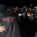 Hundreds of Juneau residents turnout Friday, Feb. 1, 2019, in 8-degree weather for a candlelight vigil at Mayor Bill Overstreet Park for the Guardian medical flight crew that went missing this week. (Michael Penn | Juneau Empire)