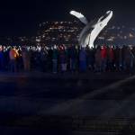 Hundreds of Juneau residents turnout Friday, Feb. 1, 2019, in 8-degree weather for a candlelight vigil at Mayor Bill Overstreet Park for the Guardian medical flight crew that went missing this week. (Michael Penn | Juneau Empire)