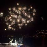 Fireworks are set off as hundreds of Juneau residents attend a candlelight vigil at Mayor Bill Overstreet Park on Friday, Feb. 1, 2019, in 8-degree weather for the Guardian medical flight crew that went missing this week. (Michael Penn | Juneau Empire)