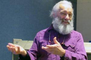 LaVern Beier speaks during his Fireside Lecture about Gobi bears at Mendenhall Glacier Visitor Center Friday, Feb.1, 2019. (Ben Hohenstatt | Juneau Empire)