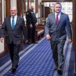 Sen. John Coghill, R-North Pole, left, and Sen. Mike Shower, R-Wasilla, power walk to attend Gov. Mike Dunleavys State of the State speech to a Joint Session of the Alaska Legislature on Tuesday, Jan. 22, 2019. (Michael Penn | Juneau Empire)