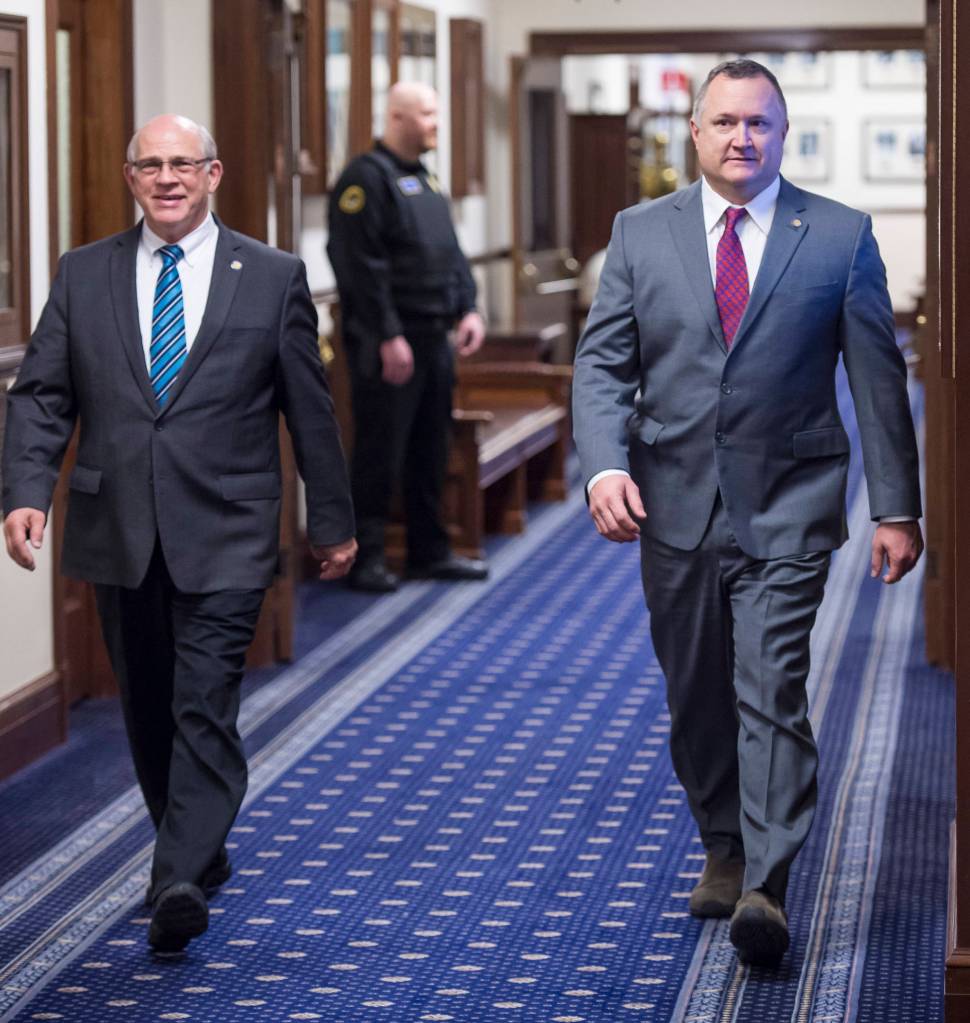 Sen. John Coghill, R-North Pole, left, and Sen. Mike Shower, R-Wasilla, power walk to attend Gov. Mike Dunleavys State of the State speech to a Joint Session of the Alaska Legislature on Tuesday, Jan. 22, 2019. (Michael Penn | Juneau Empire)