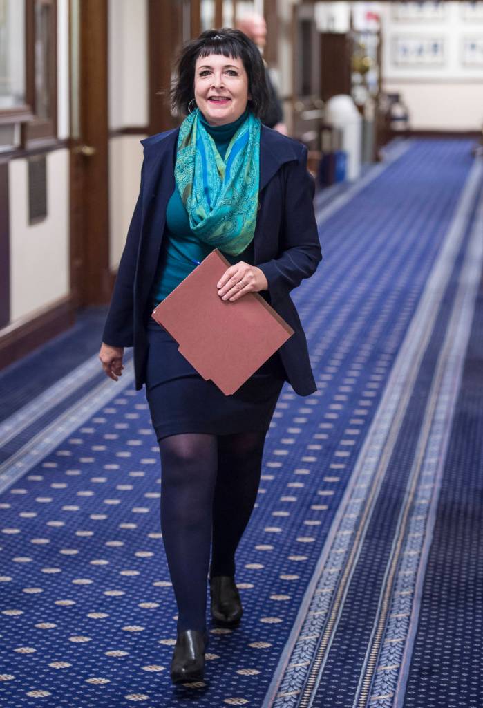 Sen. Shelley Hughes, R-Palmer, walks to attend Gov. Mike Dunleavys State of the State speech to a Joint Session of the Alaska Legislature on Tuesday, Jan. 22, 2019. (Michael Penn | Juneau Empire)