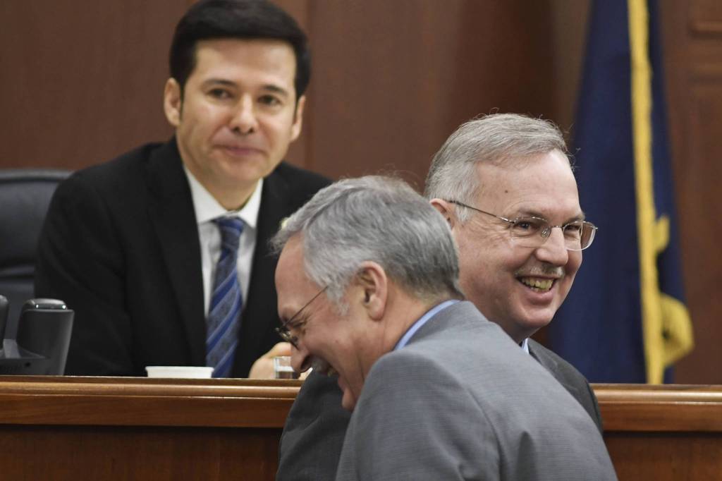 Former Speaker of the House Rep. Bryce Edgmon, D-Dillingham, right, shares a laugh with Speaker nominee Rep. David Talerico, R-Healy, as Speaker Pro Tempore Rep Neal Foster, Nome, presides over the House on Monday, Feb. 4, 2019. The House continues in a stalemakto organize permanent leadership. ( Michael Penn ι Juneau Empire)