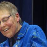 Lin Davis reads an original poem during the Stonewall 50 Tea & Dance event Saturday, Feb. 9, 2019. The event is one of several commemorations of the 50th anniversary of the gay rights milestone planned for this year. (Ben Hohenstatt | Capital City Weekly)