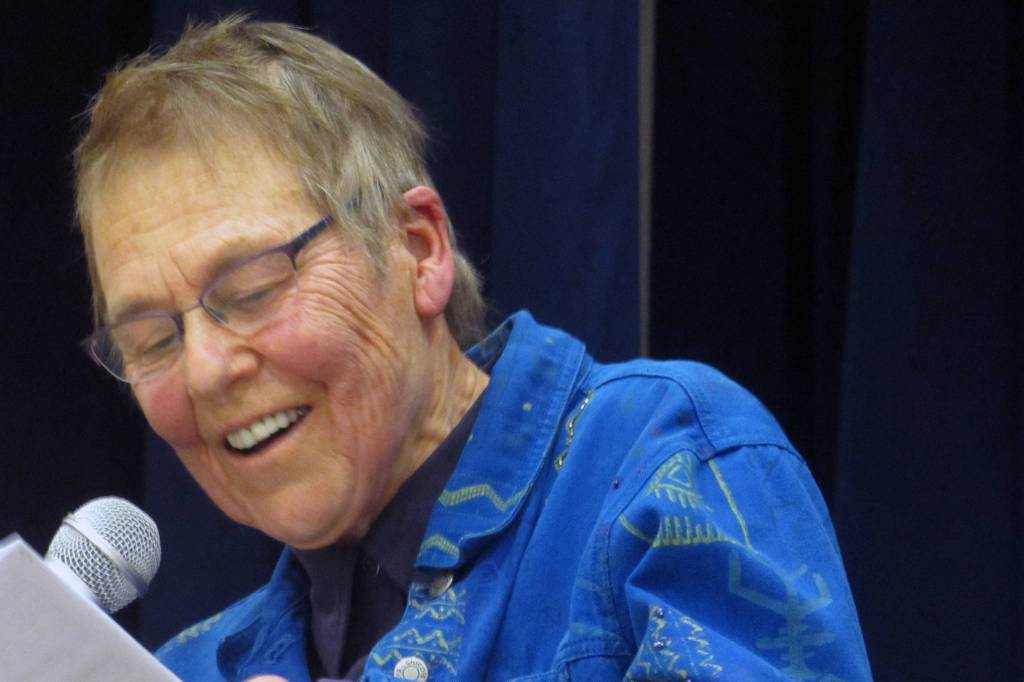 Lin Davis reads an original poem during the Stonewall 50 Tea & Dance event Saturday, Feb. 9, 2019. The event is one of several commemorations of the 50th anniversary of the gay rights milestone planned for this year. (Ben Hohenstatt | Capital City Weekly)