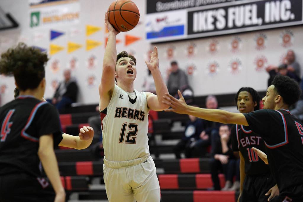 Juneau-Douglas Brock McCormick shoots against East Anchorage at JDHS on Friday, Feb. 8, 2019. East won 66-54. (Michael Penn | Juneau Empire)
