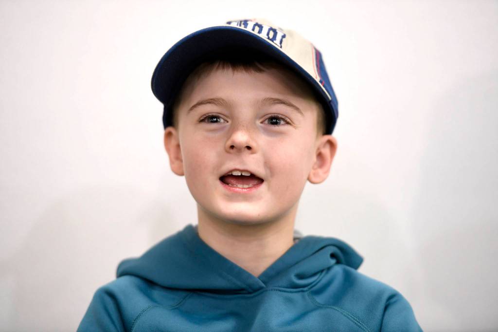 Candyn Clancy, 8, talks about attending the National Football Leagues Super Bowl game this year. (Michael Penn | Juneau Empire)