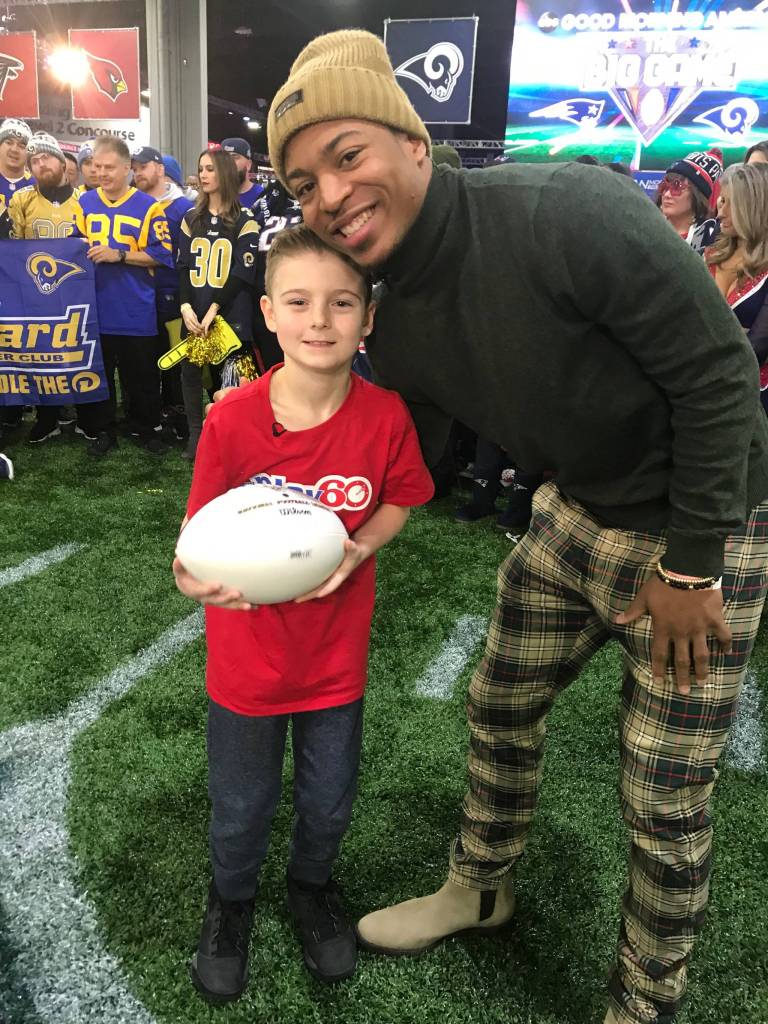 Camdyn Clancy poses with Seattle Seahawks wide receiver Tyler Lockett after a taping of ABCs Good Morning America on Friday, Feb. 1. Clancy served as the shows kid correspondent during the week of Super Bowl LIII in Atlanta. (Courtesy Photo | Hannah Clancy)
