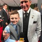 Atlanta Falcons owner Arthur Blank hugs Juneaus Camdyn Clancy on the Red Carpet during the NFL Honors at the FOX Theatre in Atlanta on Saturday, Feb. 2. The Juneau third-grader and Seattle Seahawks superfan won an all-expense paid trip to cover Super Bowl LIII as the grand prize winner of the NFL PLAY 60 Super Kid contest. (Courtesy Photo | Hannah Clancy)