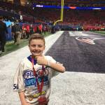 Camdyn Clancy, 8, soaks up the Super Bowl LIII pregame at the Mercedes-Benz Stadium on Sunday, Feb. 3, 2019. The Juneau third-grader and Seattle Seahawks superfan won an all-expense paid trip to cover the big game as the grand prize winner of the NFL PLAY 60 Super Kid contest. (Courtesy Photo | Hannah Clancy)