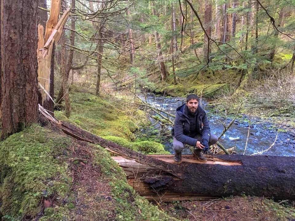 Rafael Thomaseto, one of the producers and creators of Sitka, a planned series set in the Southeast Alaska city, walks in the woods during a visit to Sitka. Courtesy photo | For Sitka)