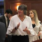 Rep. Sara Hannan, D-Juneau, claps as she introduces a guest during a House of Representatives floor session on Tuesday. (Alex McCarthy | Juneau Empire)