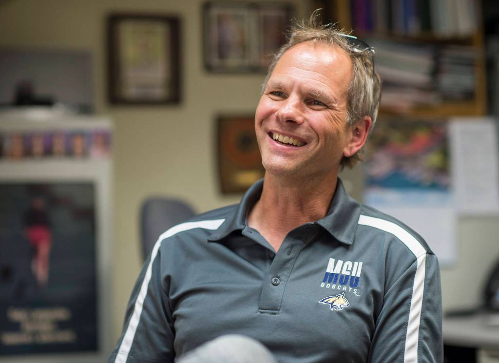 Scott May talks about his coaching career during an interview at his office at Riverbend Elementary School last August. (Michael Penn | Juneau Empire)