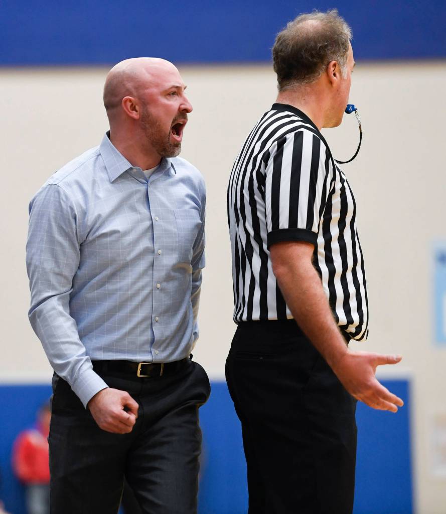 Thunder Mountains coach John Blasco yells at the referee as they play Juneau-Douglas at THMS on Friday, Feb. 15, 2019. TMHS won 69-59. (Michael Penn | Juneau Empire)