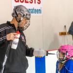Coach Jim deLabreure helps one of JDIAs youth players enjoy a break during a recent practice at Treadwell Arena. (Courtesy Photo | Steve Quinn)