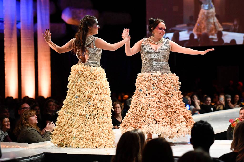 Jessica Hood and Amy Romme model their Inter-Twined at the Wearable Art show at Centennial Hall on Saturday, Feb. 16, 2019. (Michael Penn | Capital City Weekly)