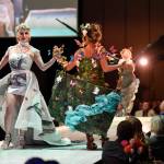 Maleny Villagomez, Samantha Harrison and Tesa Castillo work the runway with the piece Protect What is Sacred at the Wearable Art show at Centennial Hall on Saturday, Feb. 16, 2019. The artists are Paty Villagomez and Glo Ramirez. (Michael Penn | Capital City Weekly)