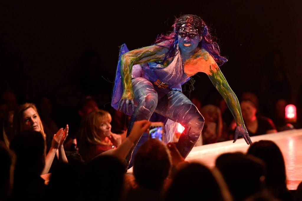 Clare Boily bring her and Hal Turmans The Siren to life at the Wearable Art show at Centennial Hall on Saturday, Feb. 16, 2019. (Michael Penn | Capital City Weekly)