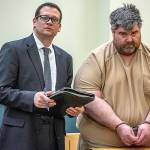 Steven Downs, 44, of Auburn, Maine, right, stands for his initial appearance in 8th District Court in Lewiston, Maine, on Tuesday, Feb. 19, 2019. Downs has been charged with the 1993 rape and murder of 20-year-old Sophie Sergie at the University of Alaska Fairbanks. Standing with Downs is Attorney Richard Charest. (Andree Kehn | Sun Journal)