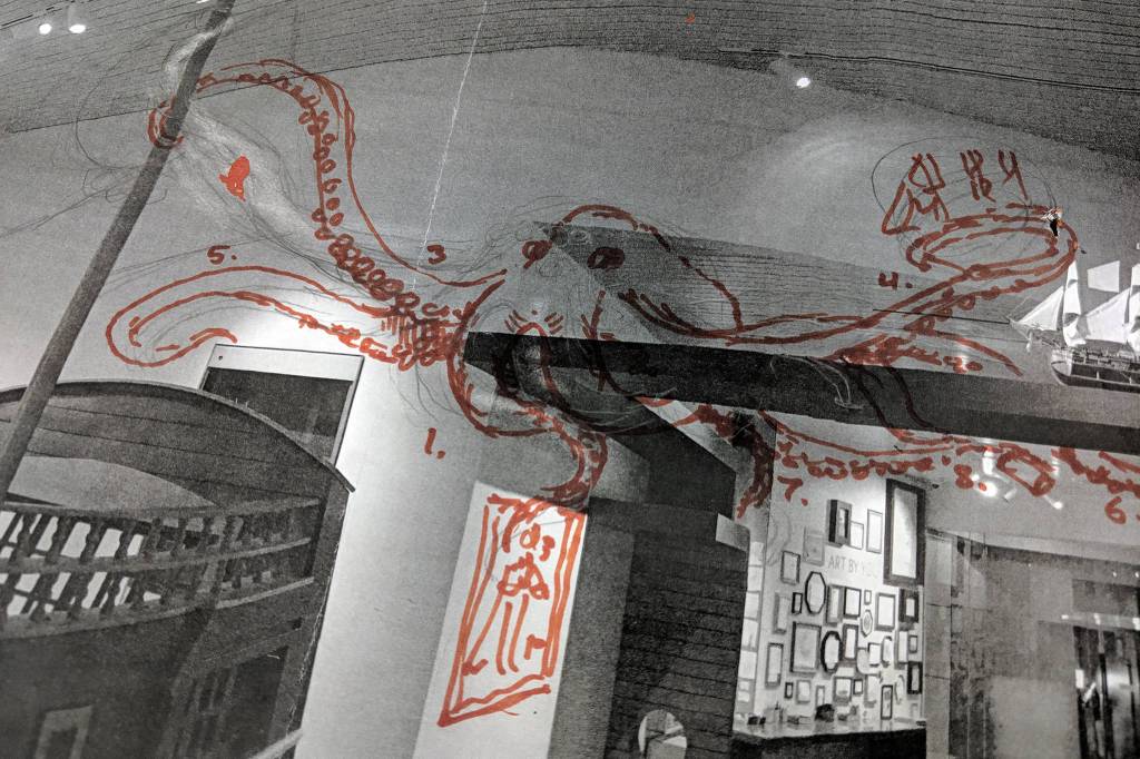 A rough sketch by Aaron Elmore shows how the Alaska State Museums new octopus installation will interact with its surroundings. The pieces that will comprise the octopus were on the move Tuesday, Feb. 19, 2019. (Ben Hohenstatt | Capital City Weekly)
