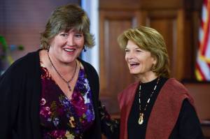 Rep. Sara Hannan, D-Juneau, shares a laugh with U.S. Sen. Lisa Murkowski, R-Alaska, after Murkowski gave her annual speech to a Joint Session of the Alaska Legislature at the Capitol on Tuesday, Feb. 19, 2019. (Michael Penn | Juneau Empire)