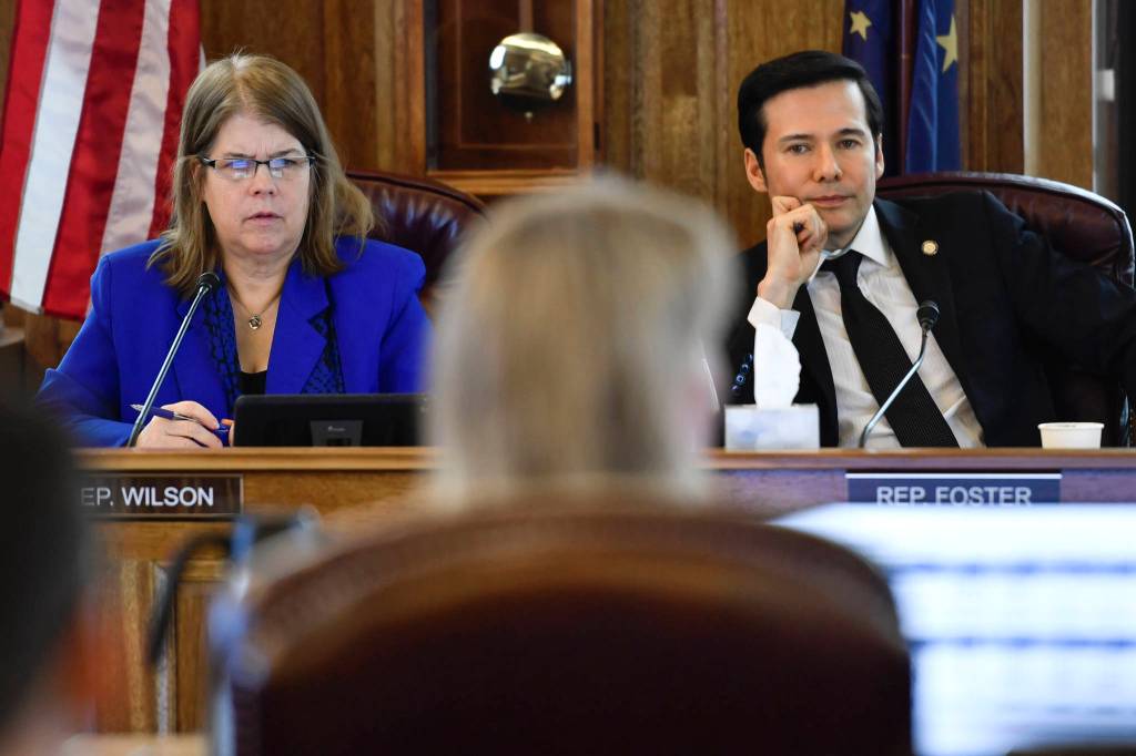 Co-Chairs of the House Finance Committee Rep. Tammie Wilson, R-North Pole, left, and Rep. Neal Foster, D-Nome, listen to Donna Arduin, Director of the Office of Management and Budget, as they hold their first meeting of the session at the Capitol on Thursday, Feb. 21, 2019. (Michael Penn | Juneau Empire)