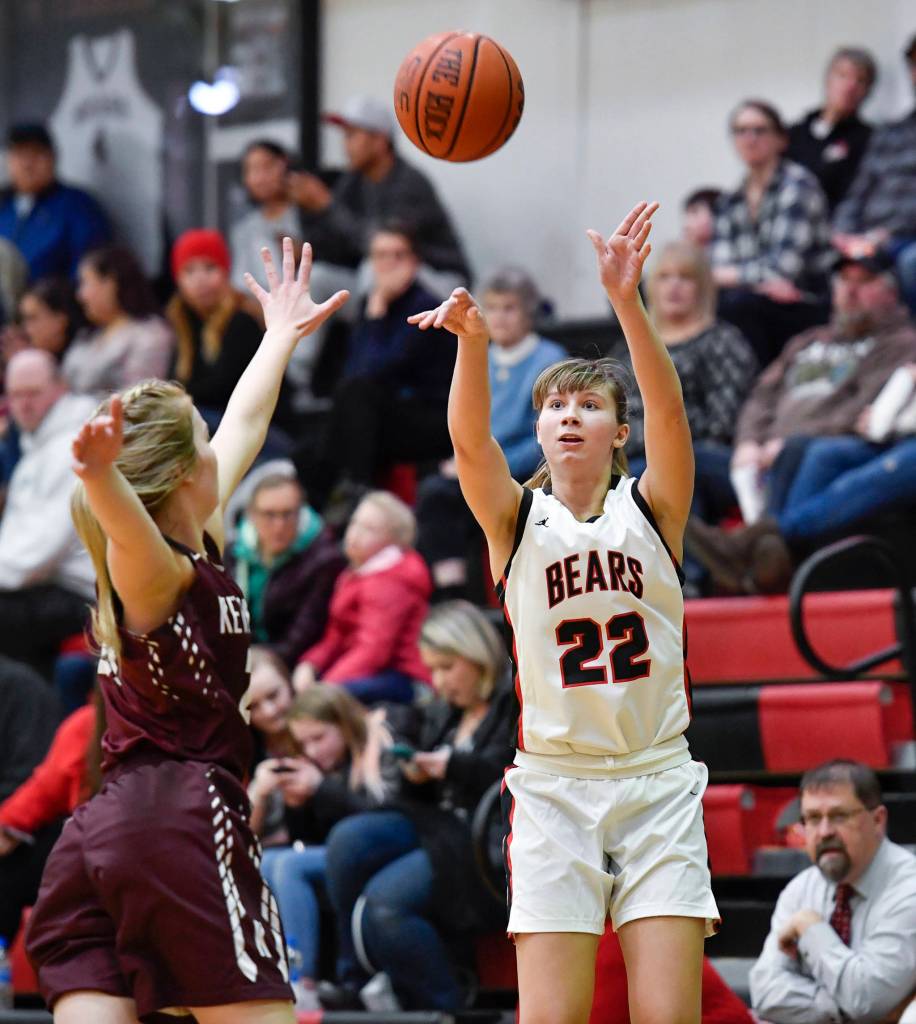 Juneau-Douglas Caitlin Pusich, right, shoot against Ketchikans Ashley Huffine at JDHS on Friday, Feb. 22, 2019. JDHS won 56-38. (Michael Penn | Juneau Empire)