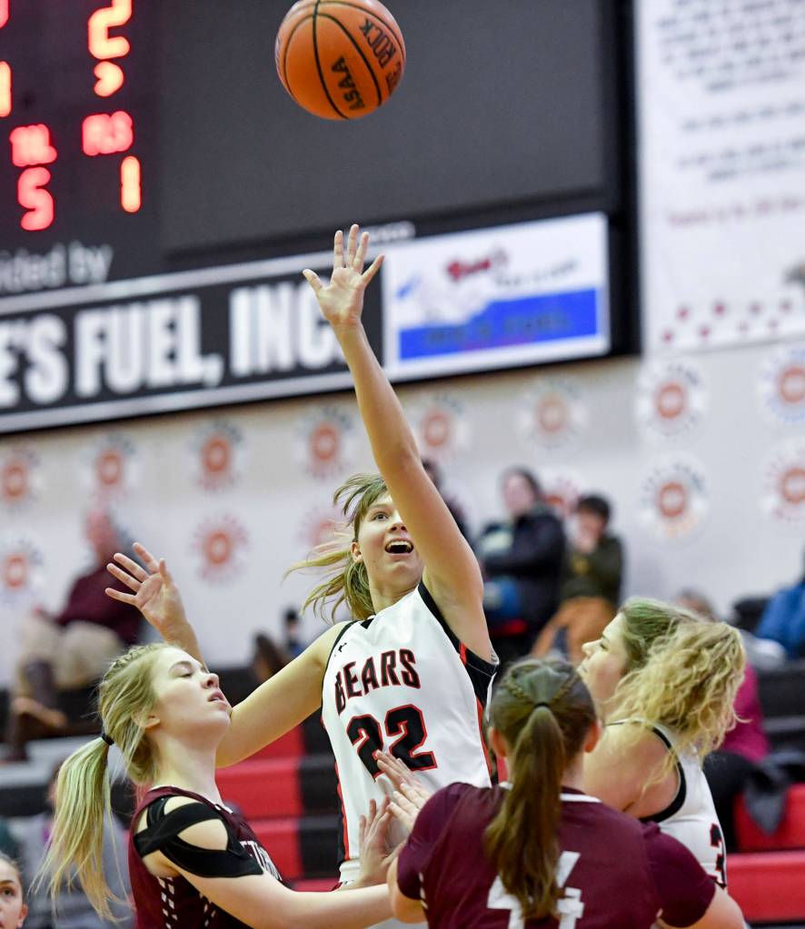 Juneau-Douglas Caitlin Pusich shoots over Ketchikans Ashley Huffine, left, at JDHS on Friday, Feb. 22, 2019. JDHS won 56-38. (Michael Penn | Juneau Empire)
