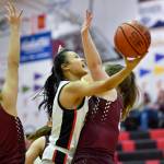 Juneau-Douglas Alyxn Bohulano lays the ball up against Ketchikan at JDHS on Friday, Feb. 22, 2019. JDHS won 56-38. (Michael Penn | Juneau Empire)