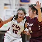 Juneau-Douglas Jenae Pusich, left, drives against Ketchikans Nadire Zhuta at JDHS on Friday, Feb. 22, 2019. JDHS won 56-38. (Michael Penn | Juneau Empire)